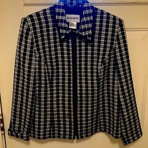 Jacket/Blazer fairly thin.  Lined inside.